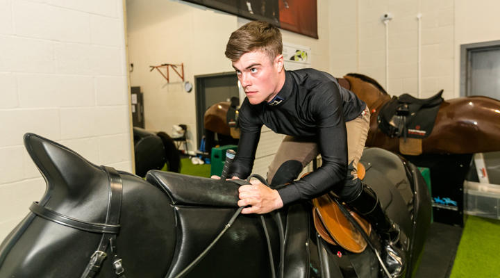 Jockey Using The Horse Simulator At Hartpury