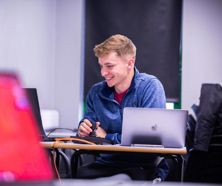 Sport Student Working On Laptop