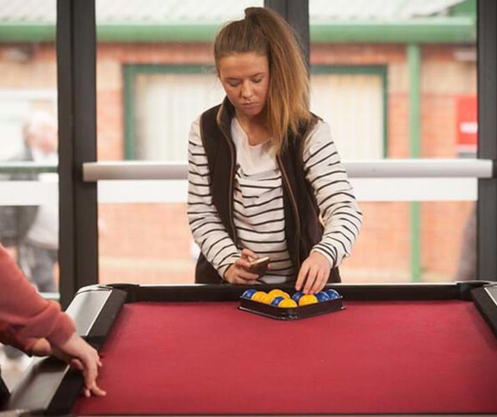 Students playing pool
