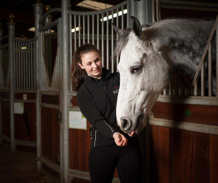 Student And Horse In Equine Yard