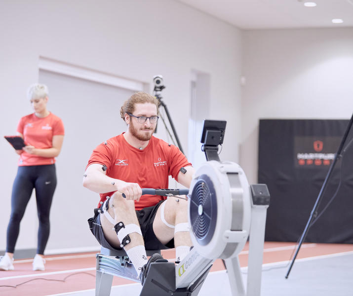 Sport Student On Rowing Machine