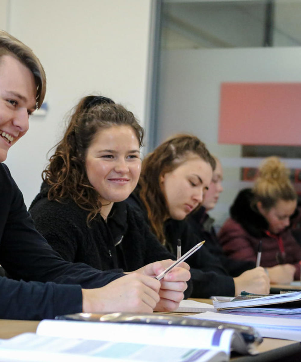 College Students In Classroom