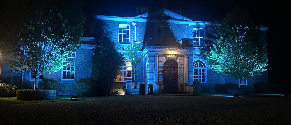 Hartpury House Lit Up Blue
