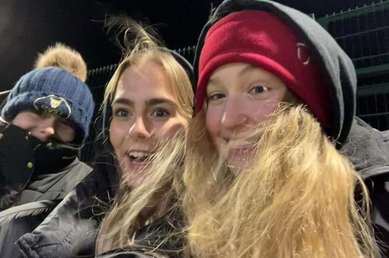 Alana and friends watching sport